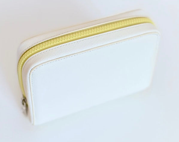 white and yellow bag insulated designer fancy and not just a snacker a cosmetic bag