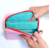 red and pink designer bag not just a lunch box insulated to keep makeup cool